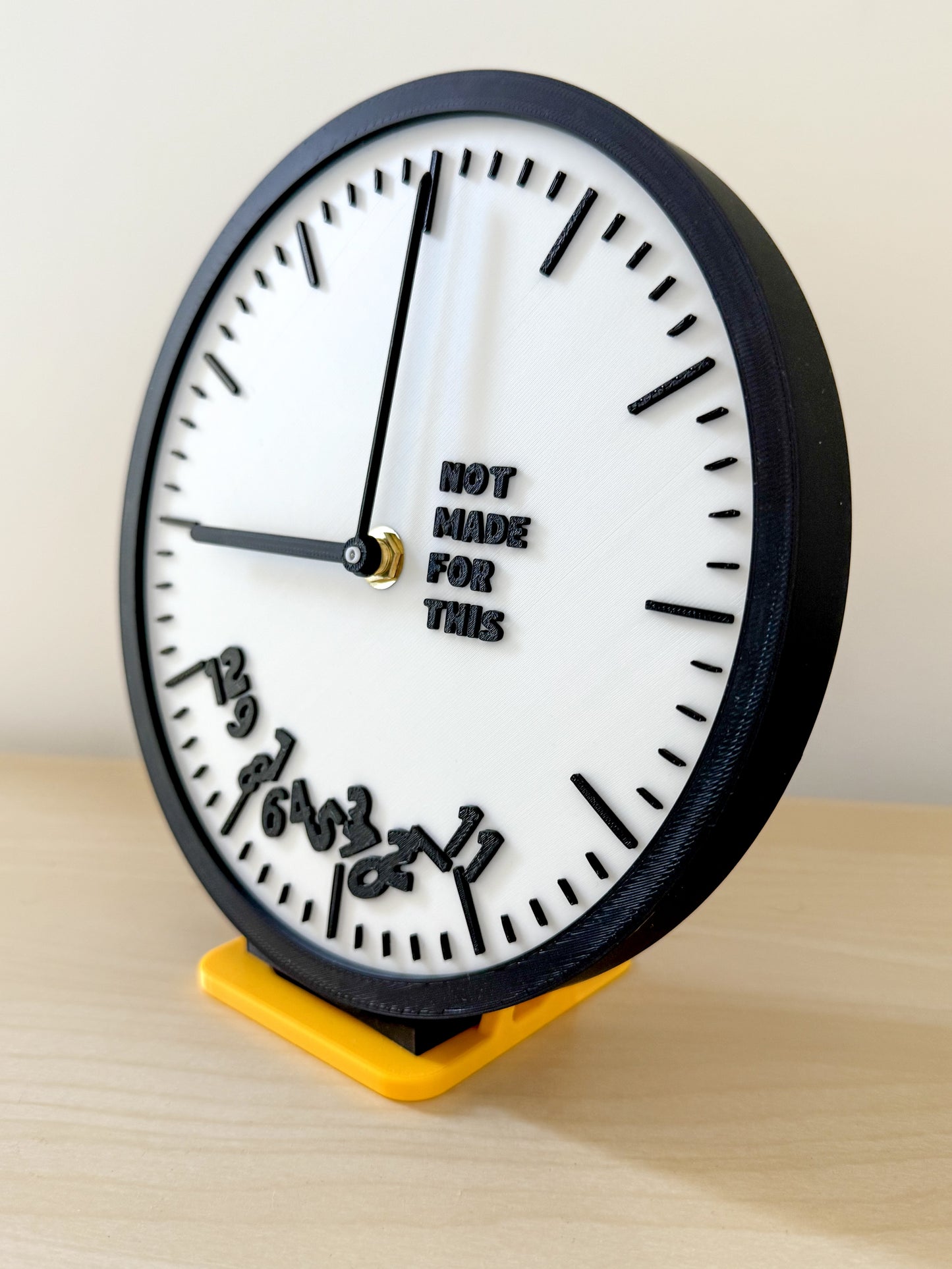 A clock with all the numbers fallen to the bottom